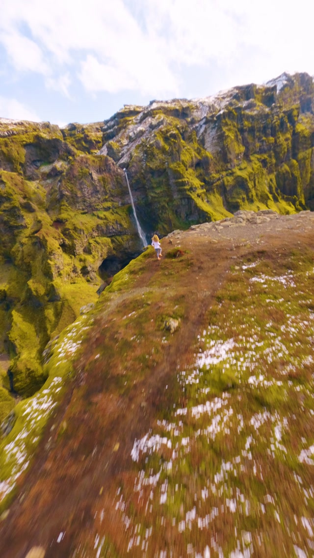 Dramatic Icelandic Canyon With Waterfall and Snow