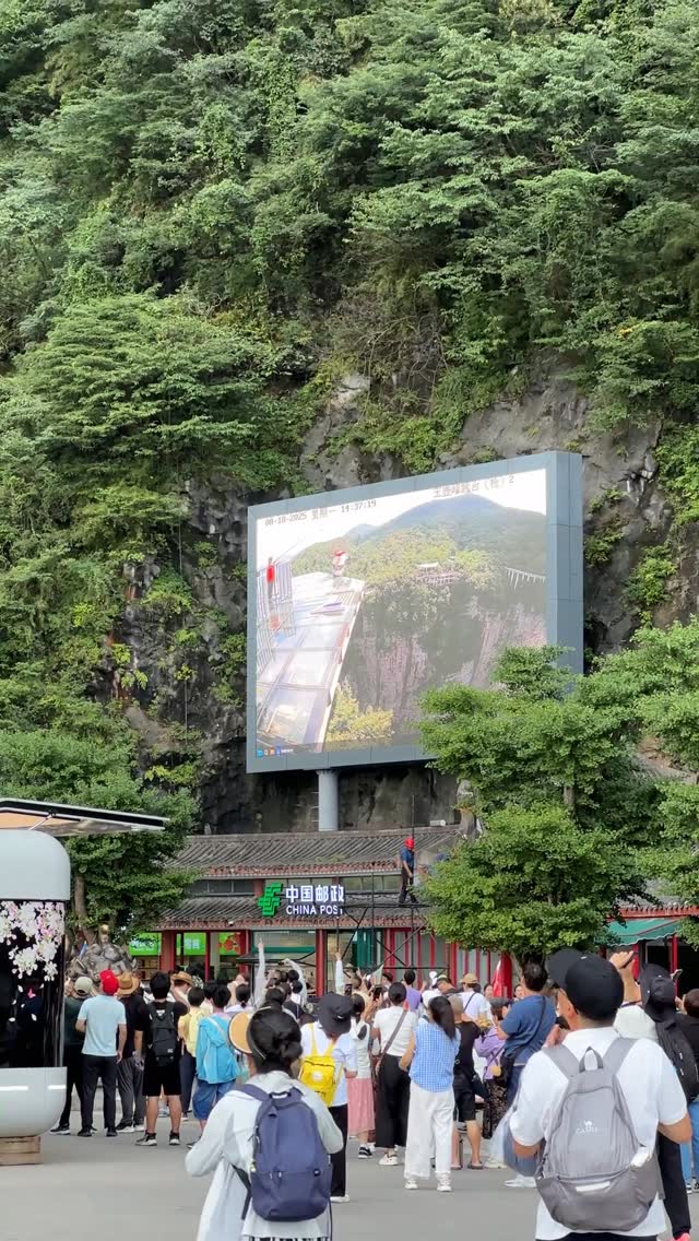 Wingsuit Flight Through Tianmen Mountain's Arch