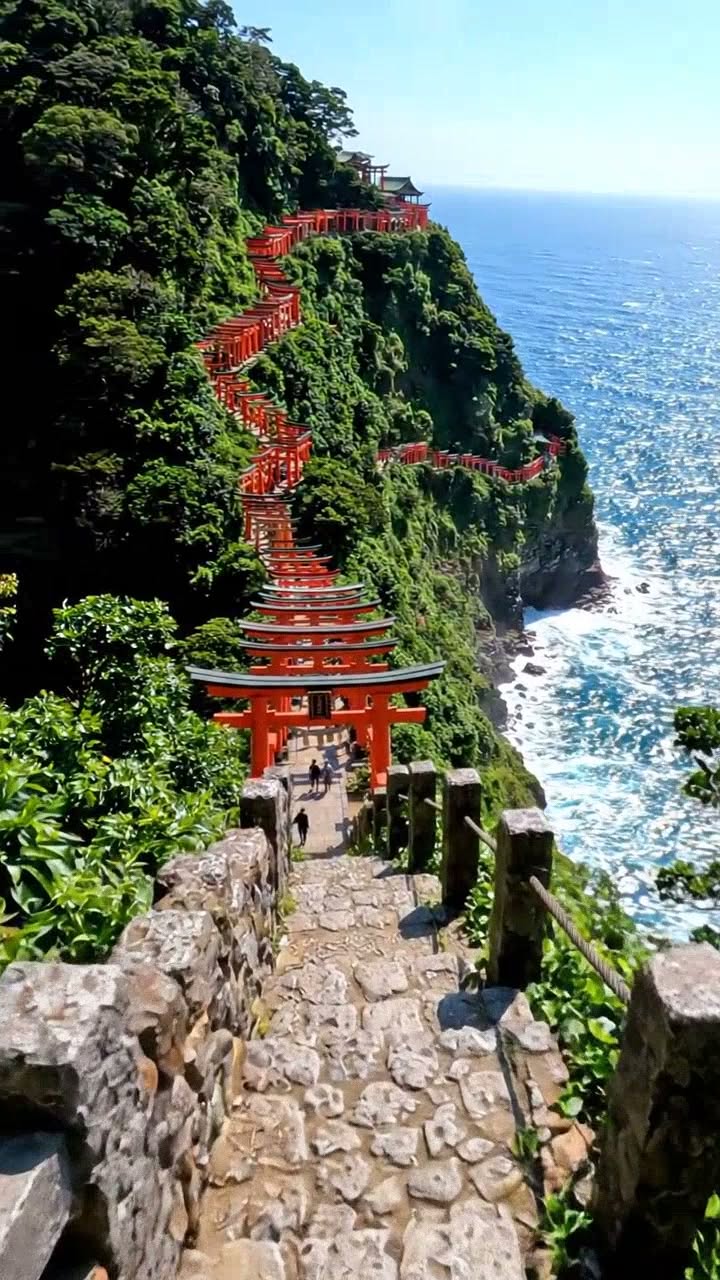 Coastal Shrine With Vermilion Torii Gates
