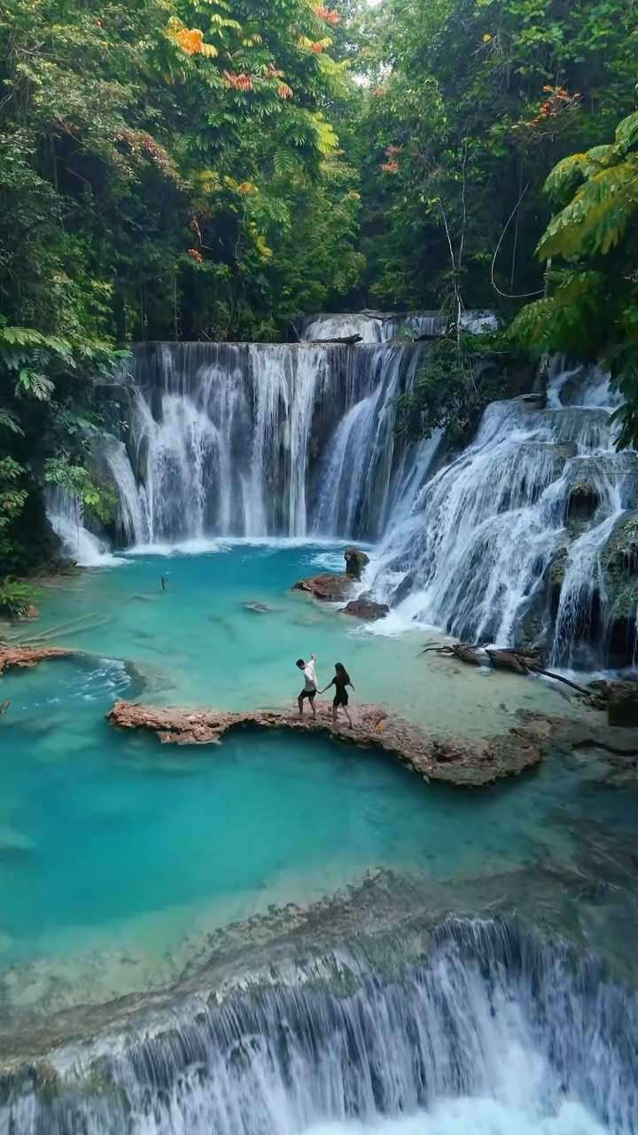 Piala Waterfall: Cascading Turquoise Waters