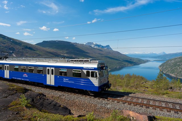 Arctic Train Journey Through Norwegian Fjords